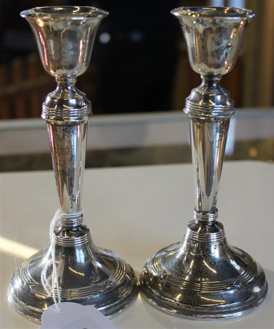 Pair silver circular candlesticks, Birmingham 1915, Wm Hutton & Sons